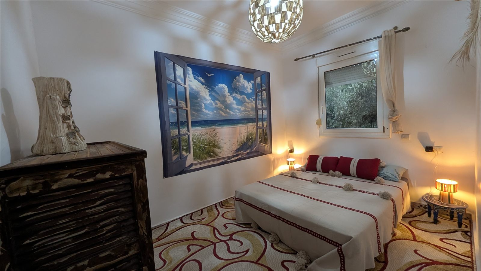 Chambre de Dar Christelle, fresque fenêtre sur la plage